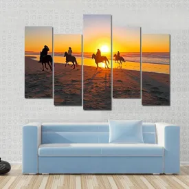 Horse Riding On Beach At Sunset Canvas Wall Art