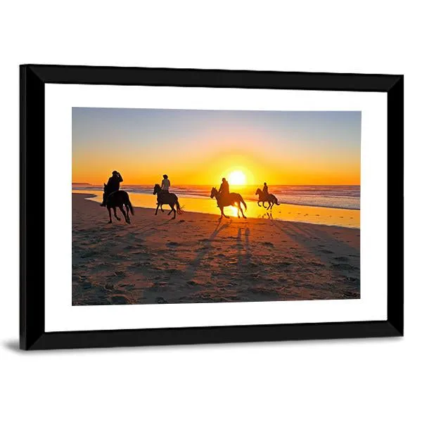 Horse Riding On Beach At Sunset Canvas Wall Art