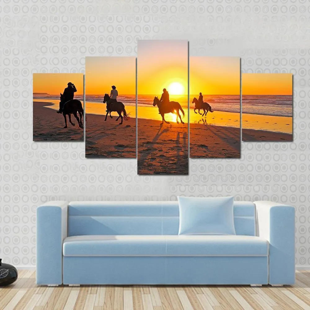 Horse Riding On Beach At Sunset Canvas Wall Art