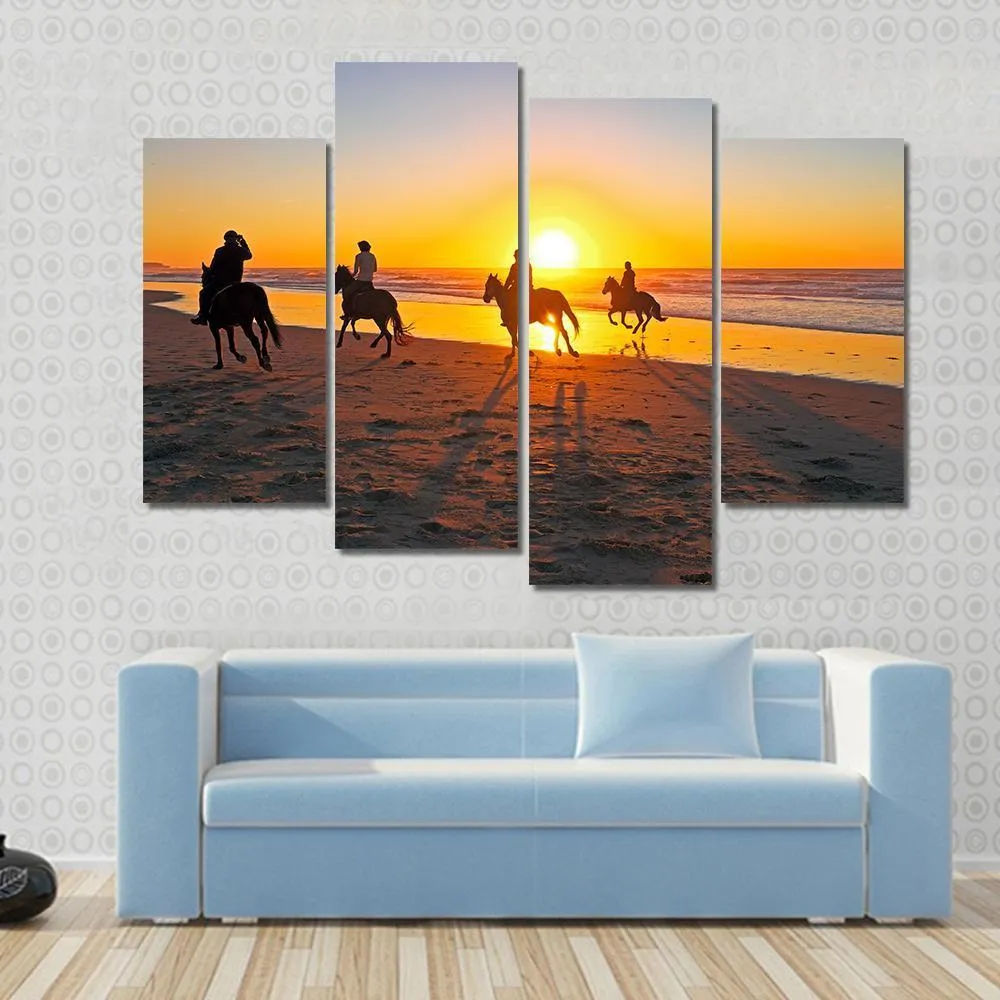 Horse Riding On Beach At Sunset Canvas Wall Art